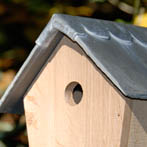 BGO Natural Bird Box in seasoned oak with recycled slate and lead roof. £40